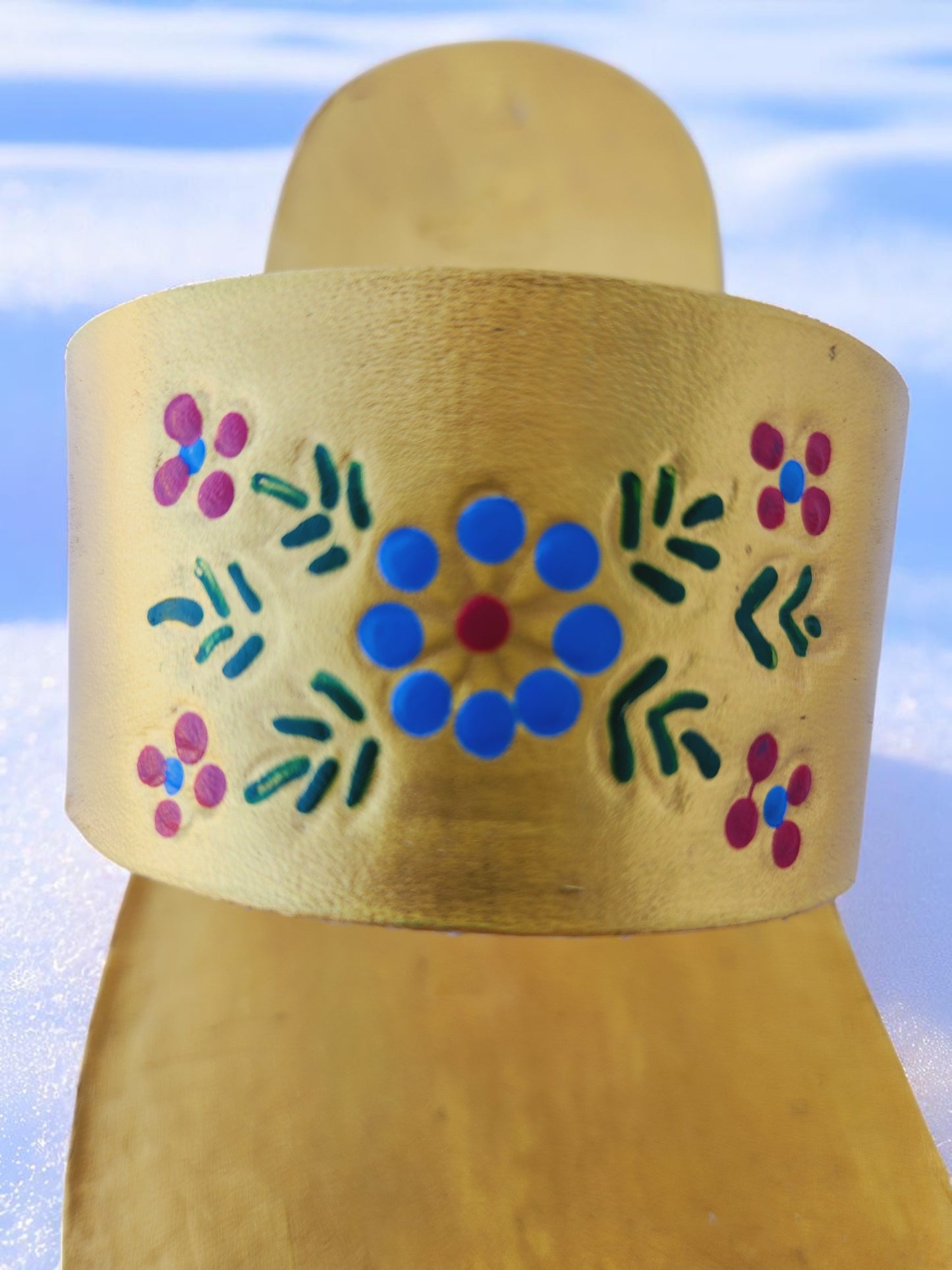 Gold color soft leather handmade toe-ring sandals with durable lightweight outsoles and hand-painted floral pattern