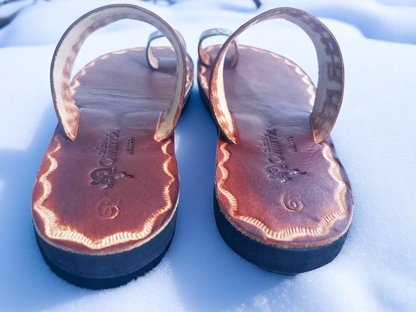 Brown soft leather handmade toe-ring sandals with durable lightweight outsoles and hand-painted floral pattern