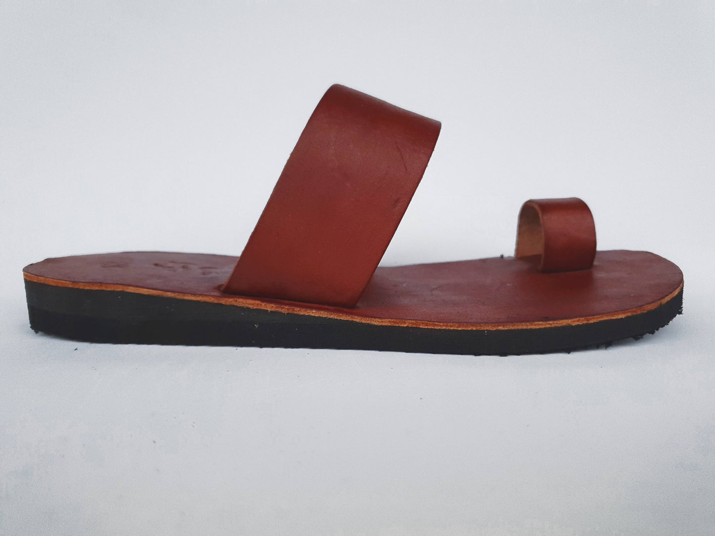 Brown soft leather handmade toe-ring sandals with durable lightweight outsoles and hand-painted floral pattern