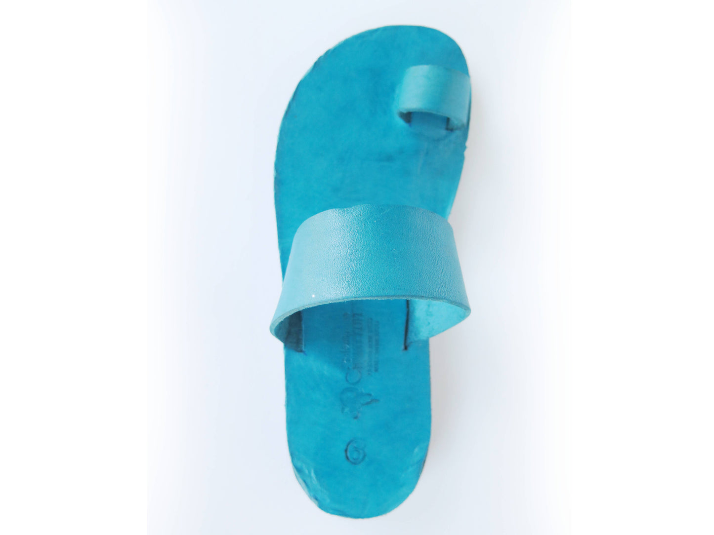 Teal turquoise color soft leather handmade toe-ring sandals with durable lightweight outsoles and hand-painted floral pattern
