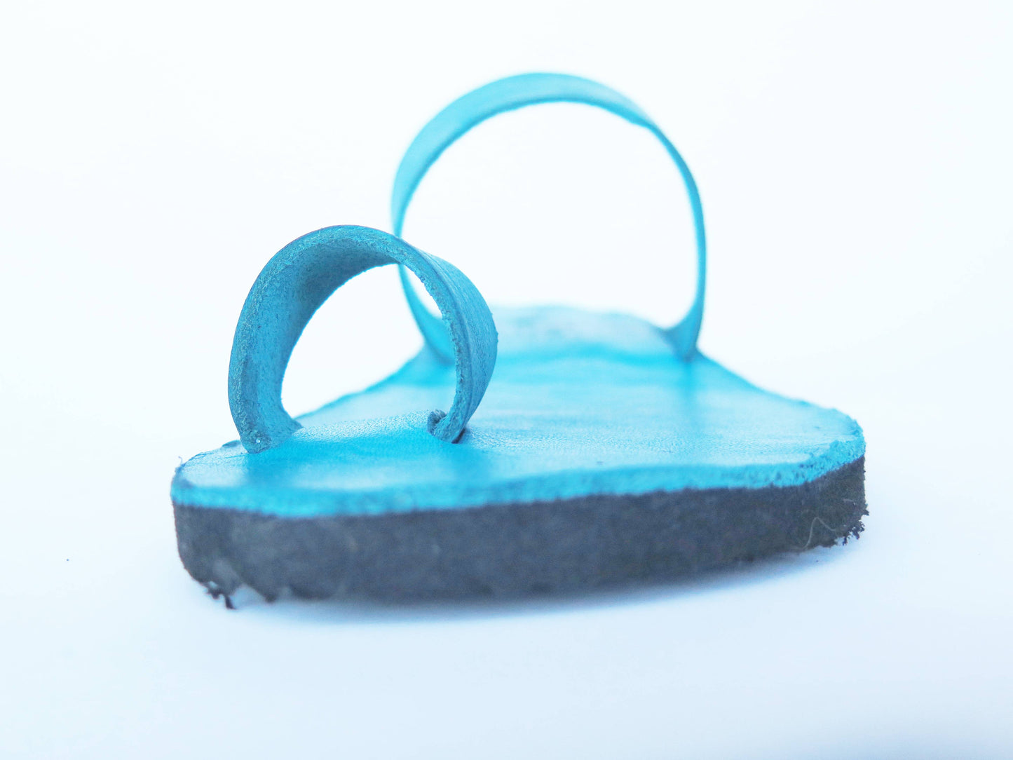 Teal turquoise color soft leather handmade toe-ring sandals with durable lightweight outsoles and hand-painted floral pattern
