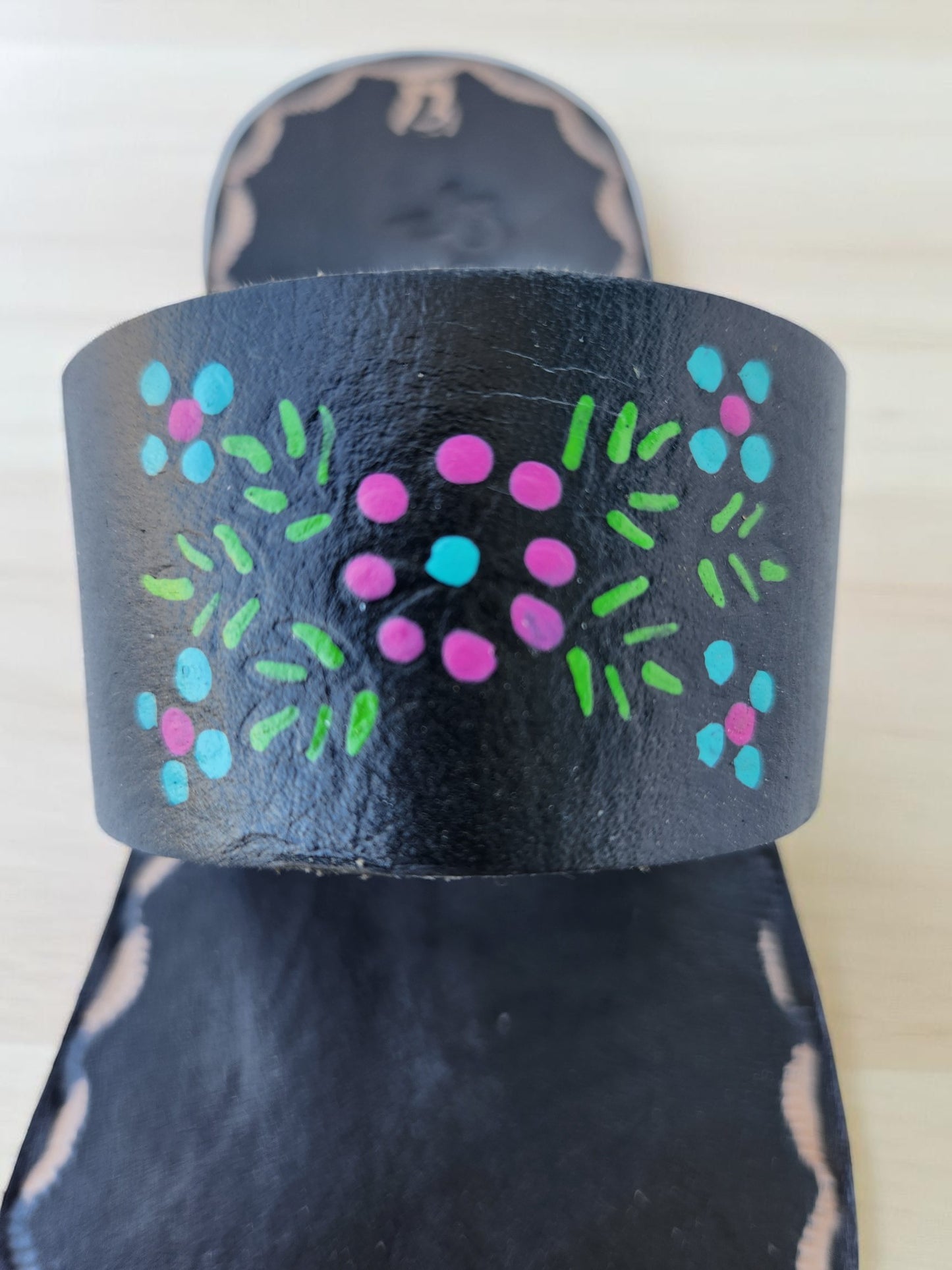 BLack soft leather handmade toe-ring sandals with  durable lightweight outsoles and hand-painted floral pattern