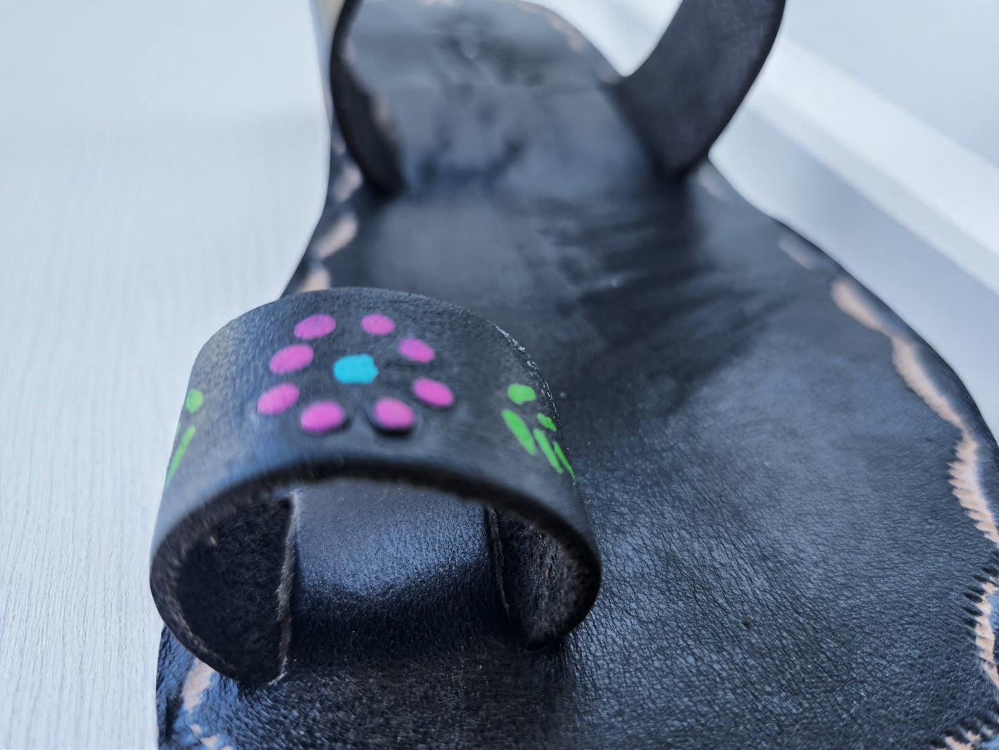 BLack soft leather handmade toe-ring sandals with  durable lightweight outsoles and hand-painted floral pattern