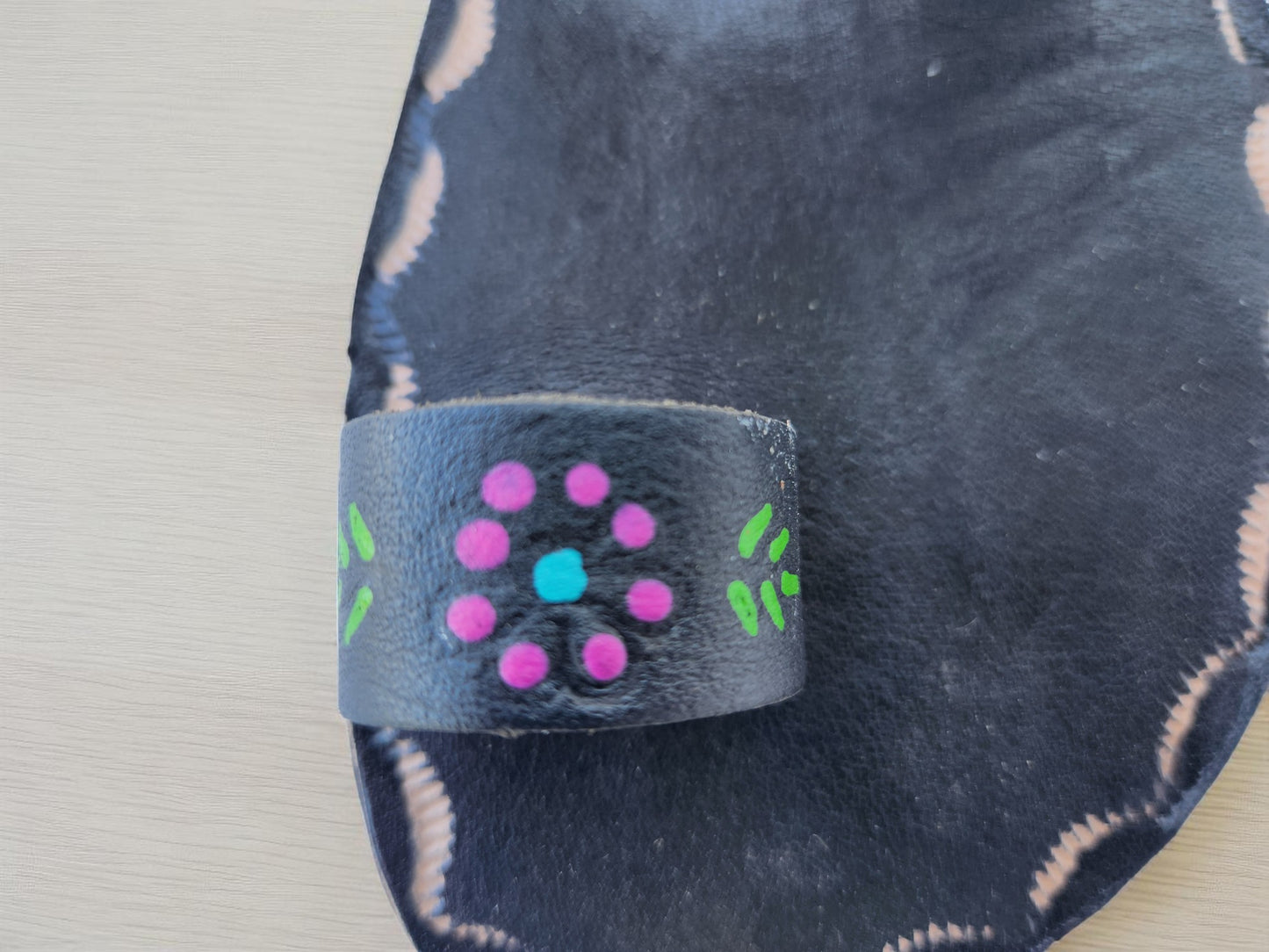 BLack soft leather handmade toe-ring sandals with  durable lightweight outsoles and hand-painted floral pattern