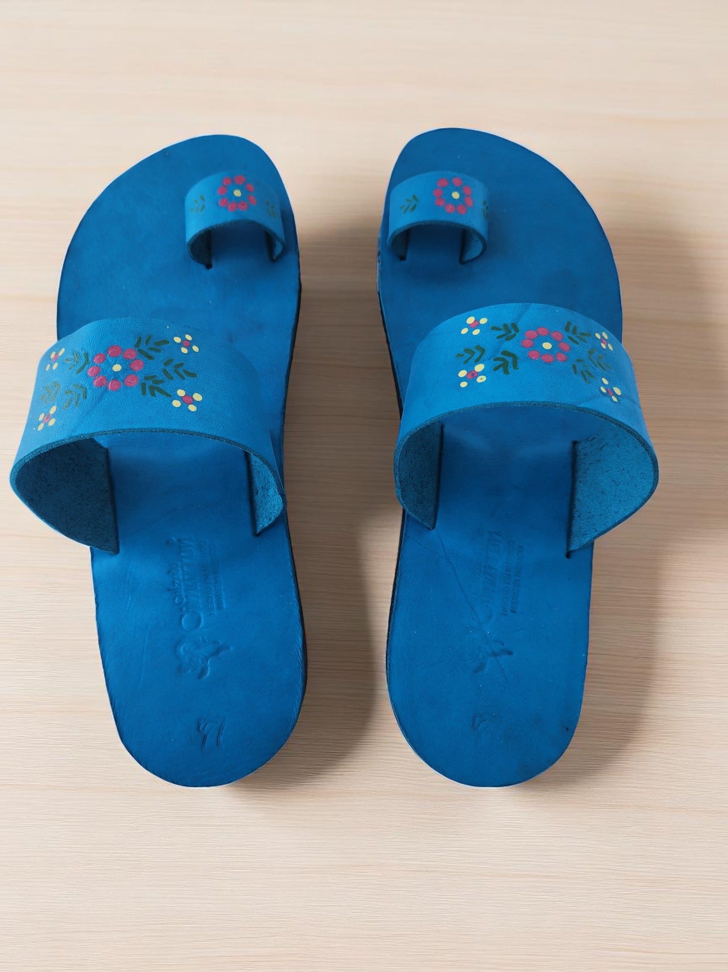Teal turquoise color soft leather handmade toe-ring sandals with  durable lightweight outsoles and hand-painted floral pattern (