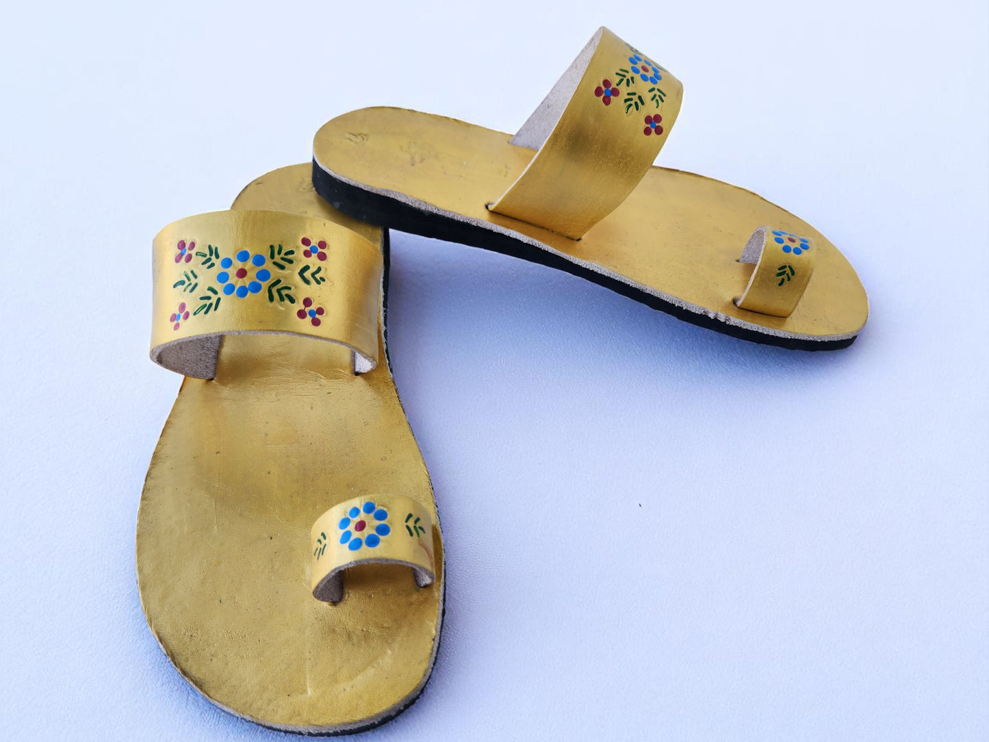 Gold color soft leather handmade toe-ring sandals with  durable lightweight outsoles and hand-painted floral pattern