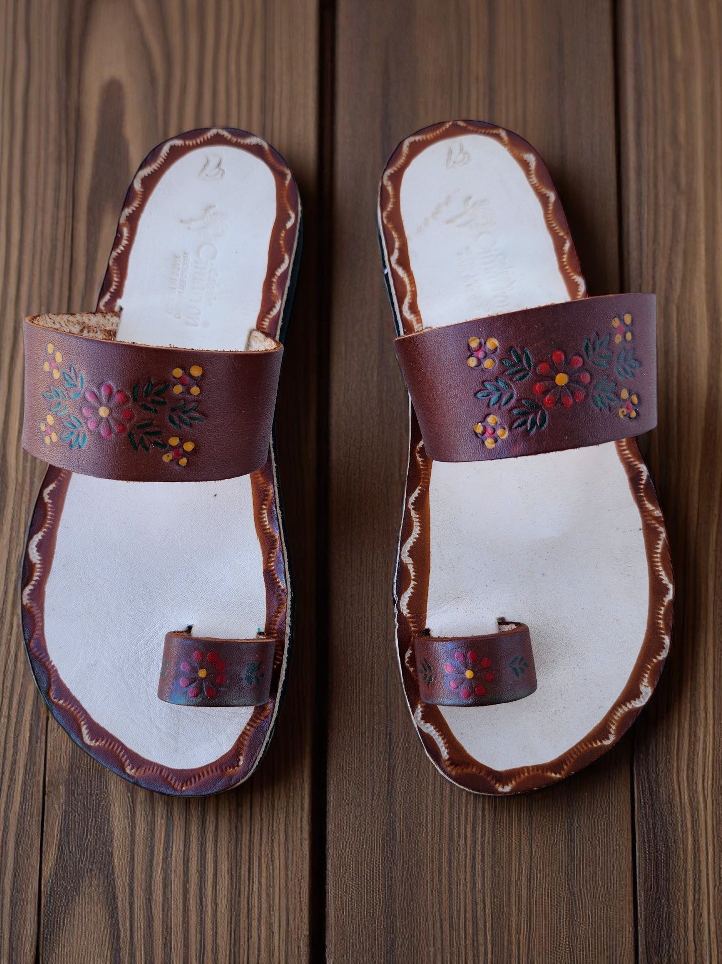 Brown and beige soft leather handmade toe-ring sandals with  durable lightweight outsoles and hand-painted floral pattern