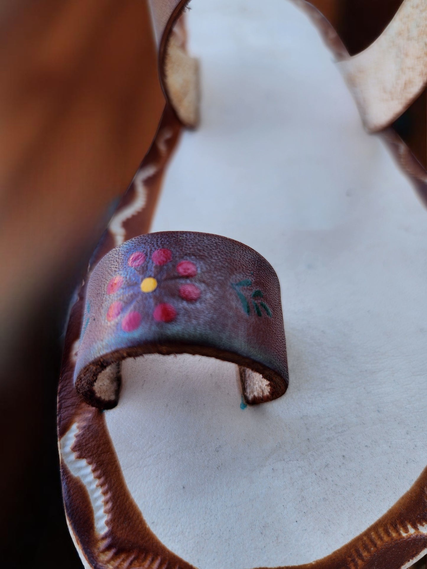 Brown and beige soft leather handmade toe-ring sandals with  durable lightweight outsoles and hand-painted floral pattern