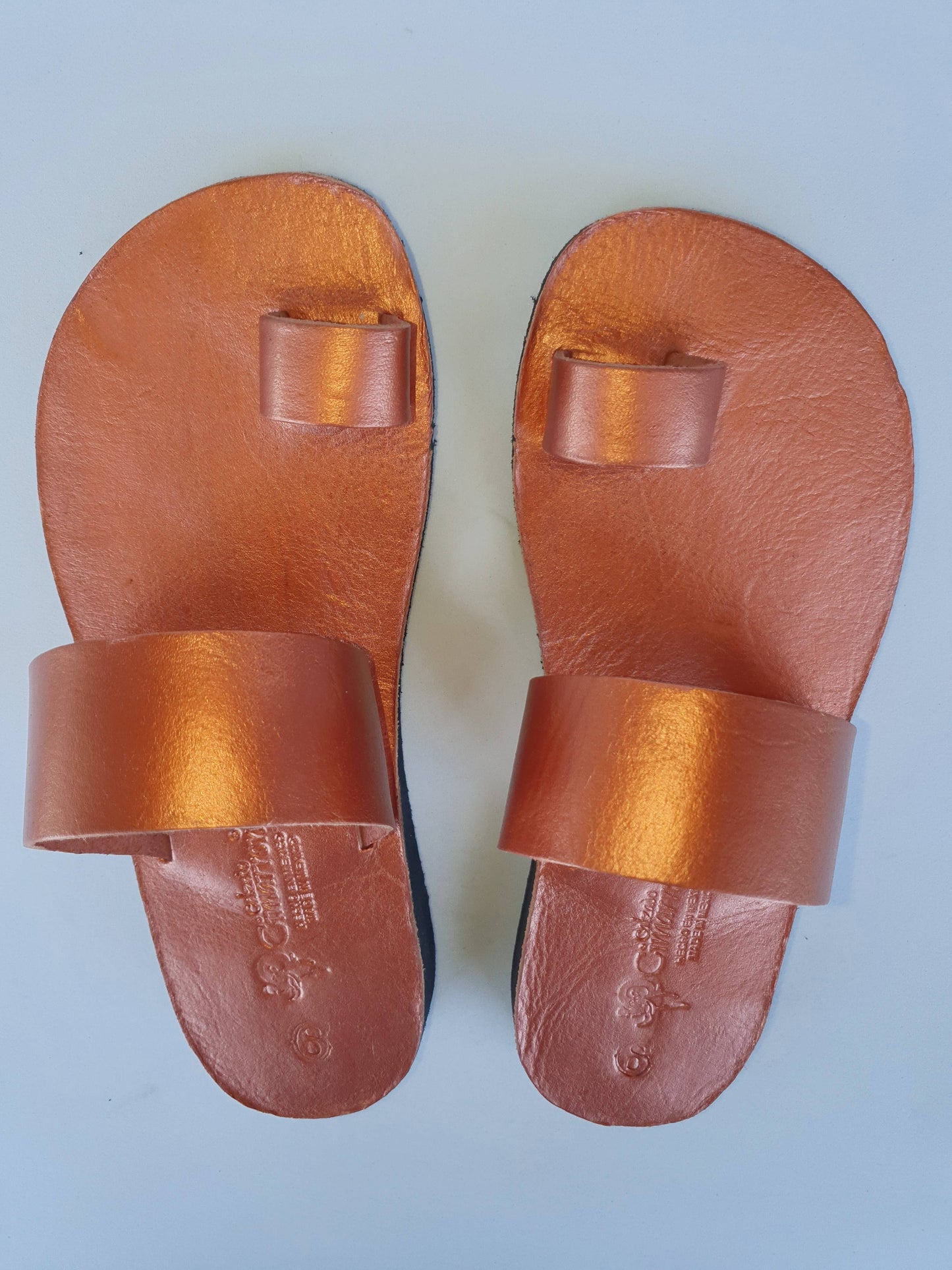 Copper color soft leather handmade toe-ring sandals with  durable lightweight outsoles and hand-painted floral pattern