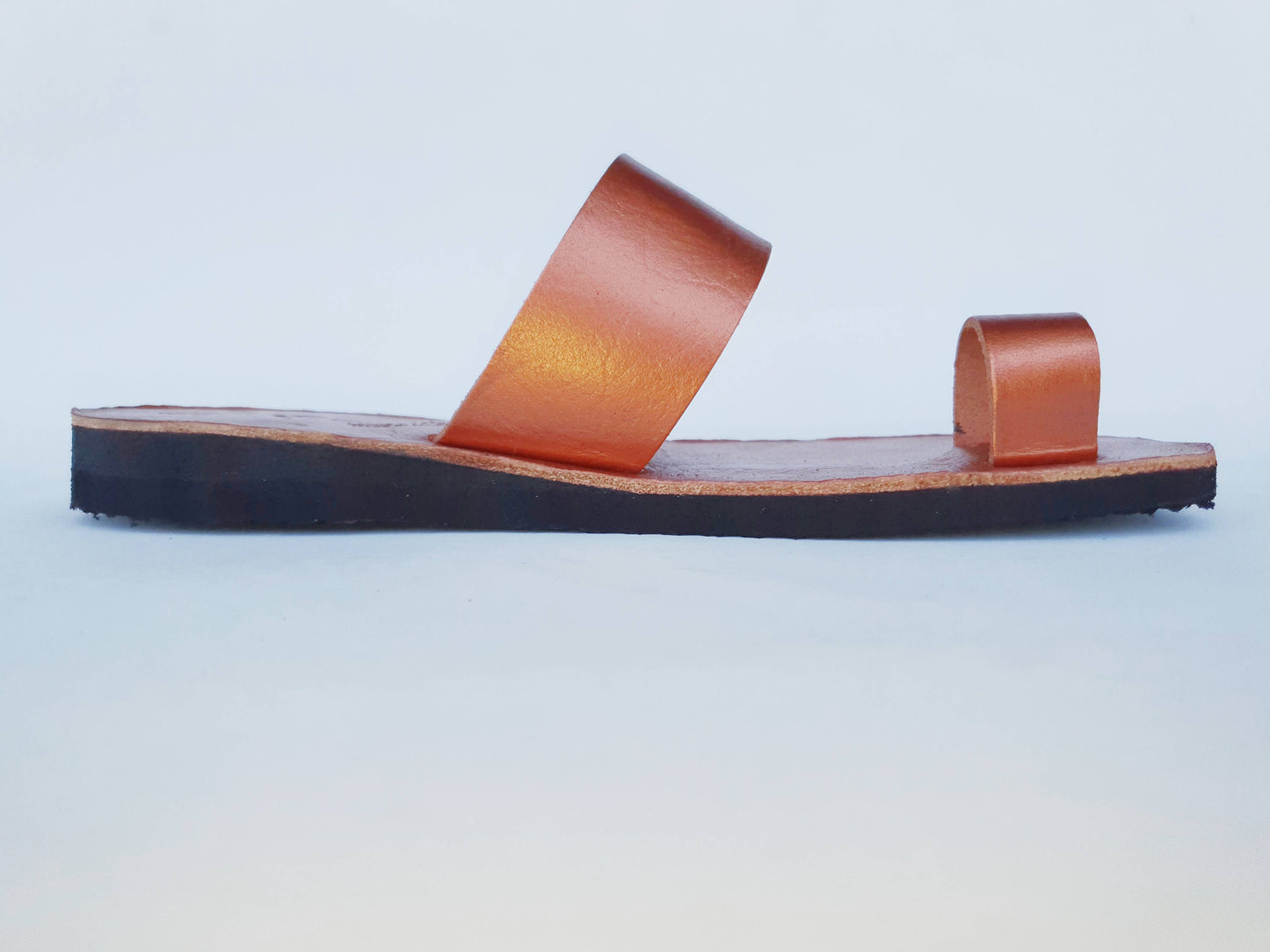 Copper color soft leather handmade toe-ring sandals with  durable lightweight outsoles and hand-painted floral pattern