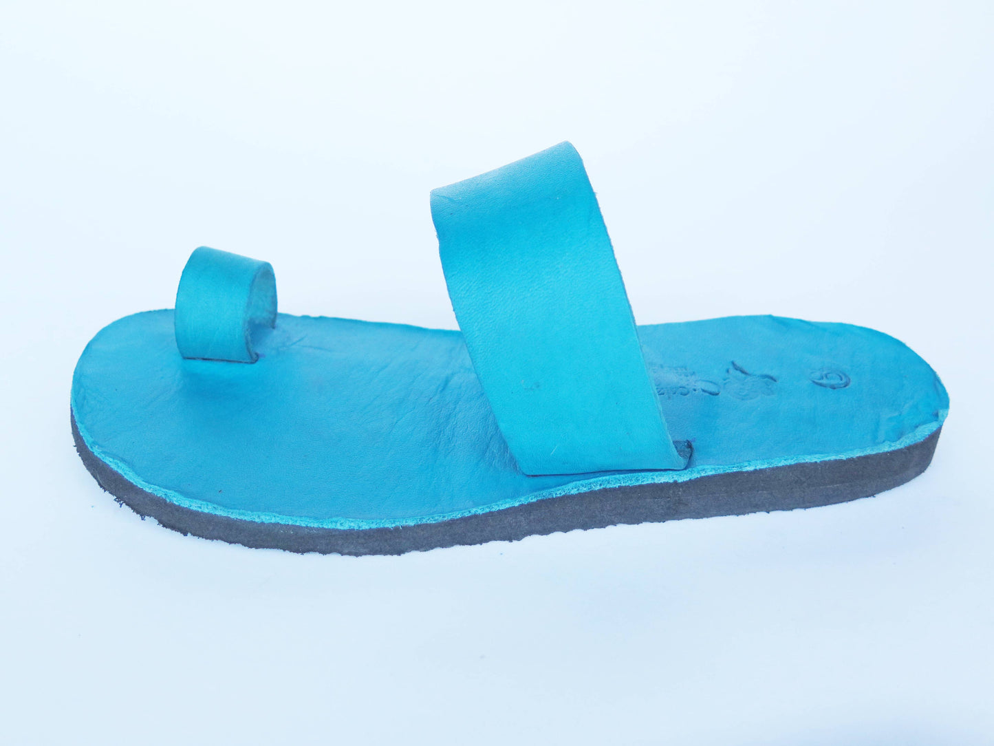 Teal turquoise color soft leather handmade toe-ring sandals with  durable lightweight outsoles and hand-painted floral pattern
