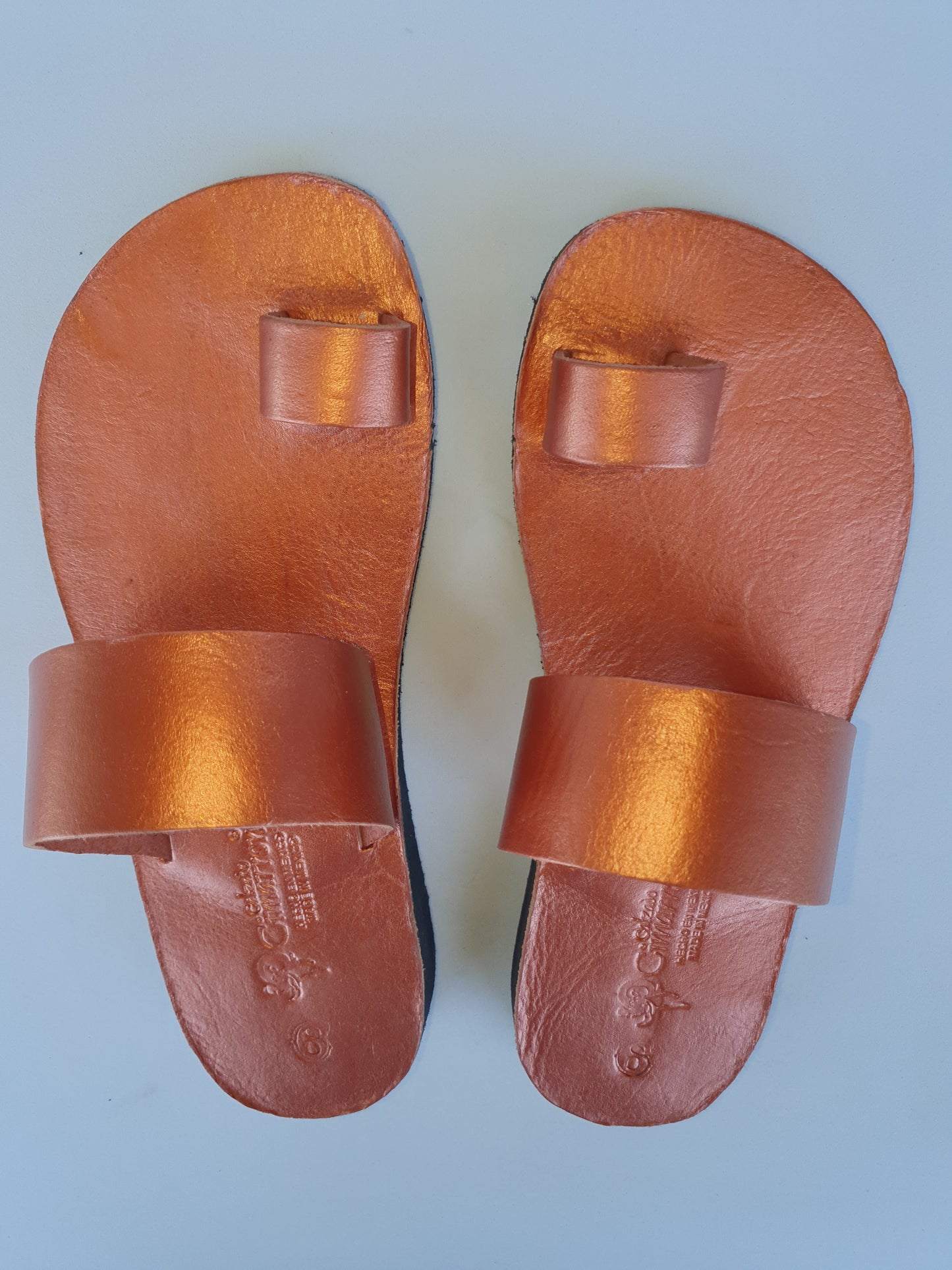 Copper color soft leather handmade toe-ring sandals with  durable lightweight outsoles and hand-painted floral pattern
