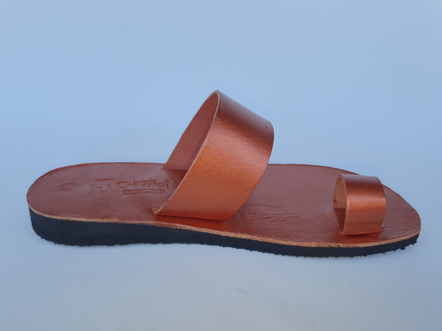 Copper color soft leather handmade toe-ring sandals with  durable lightweight outsoles and hand-painted floral pattern
