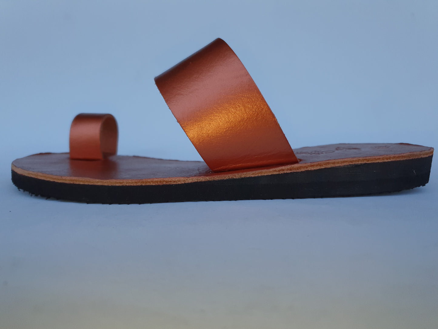Copper color soft leather handmade toe-ring sandals with  durable lightweight outsoles and hand-painted floral pattern