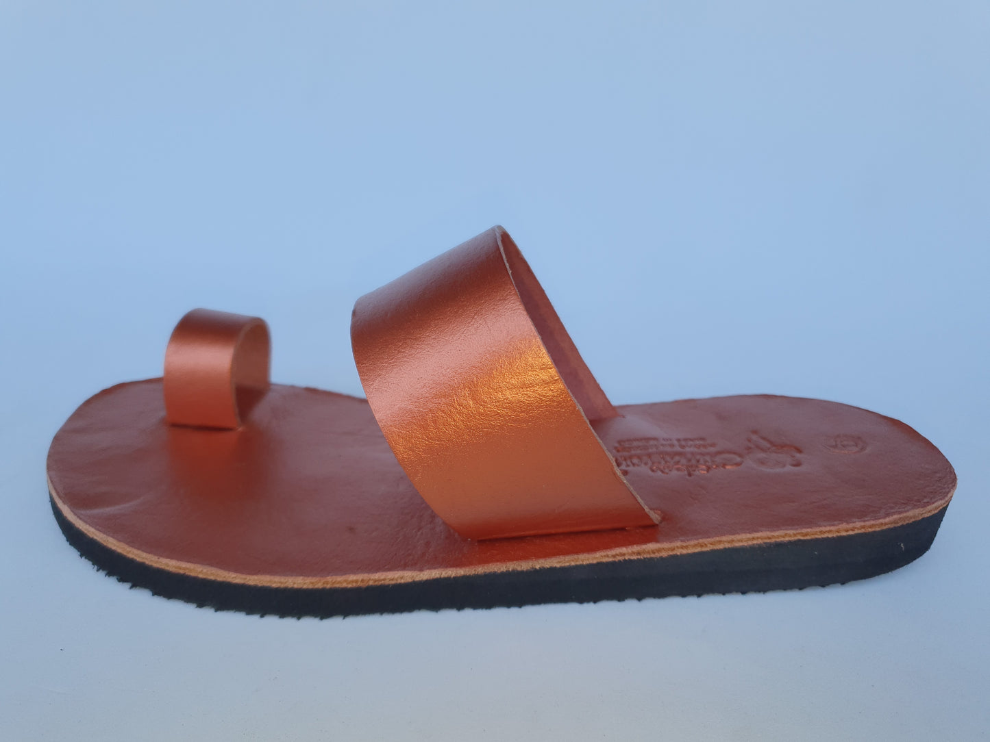 Copper color soft leather handmade toe-ring sandals with  durable lightweight outsoles and hand-painted floral pattern