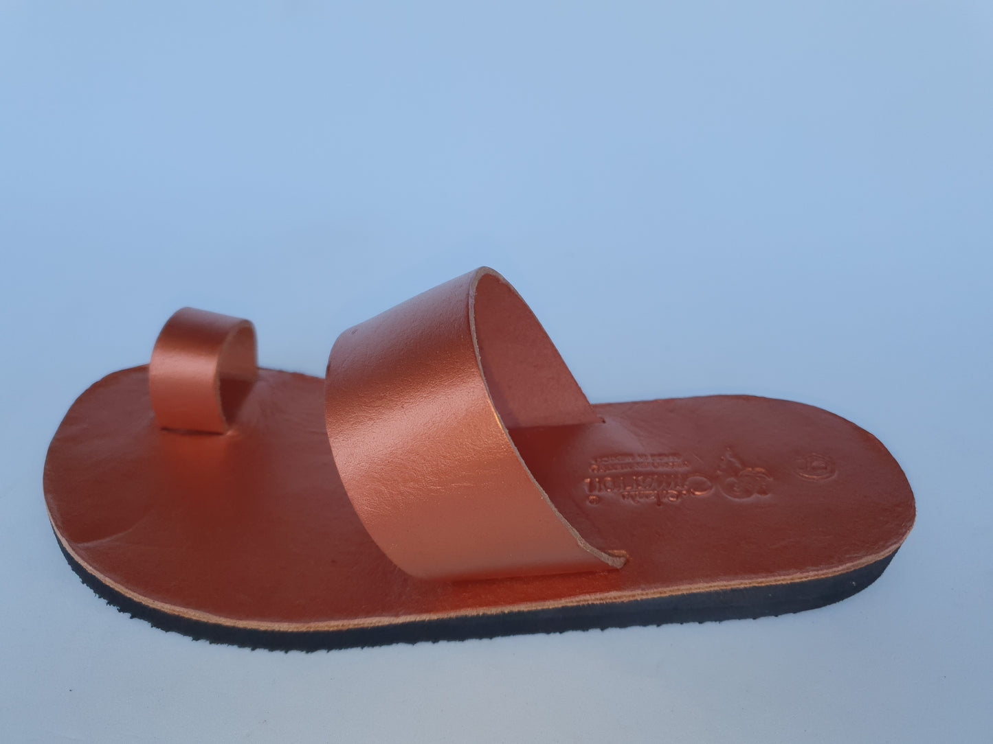 Copper color soft leather handmade toe-ring sandals with  durable lightweight outsoles and hand-painted floral pattern