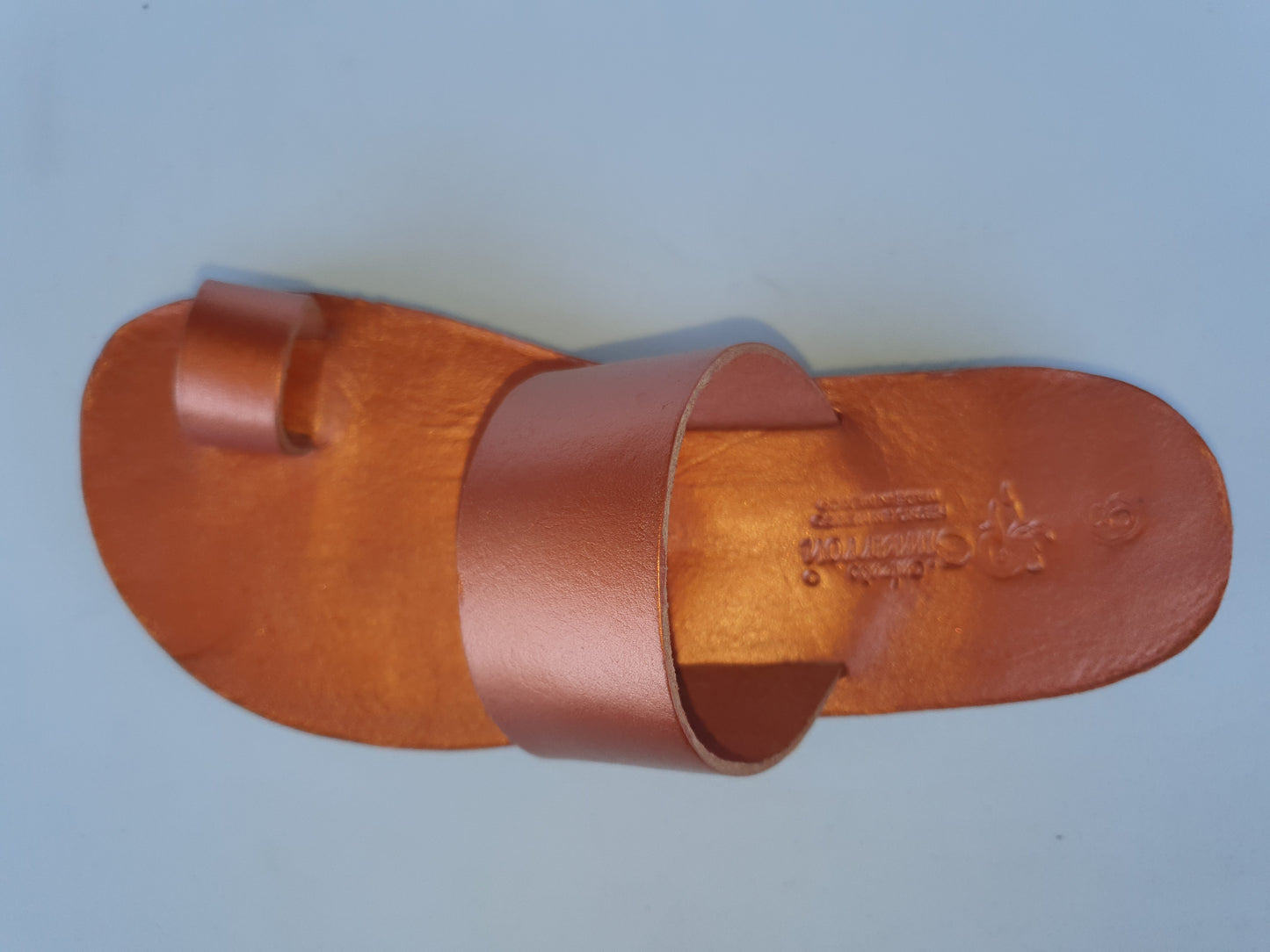 Copper color soft leather handmade toe-ring sandals with  durable lightweight outsoles and hand-painted floral pattern