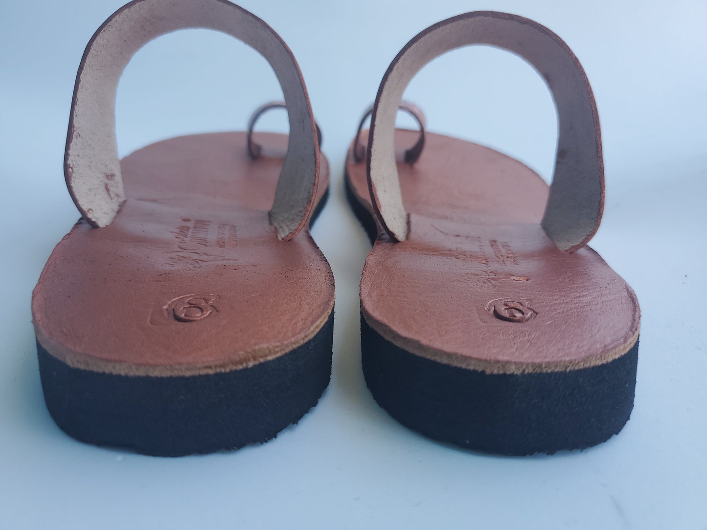 Copper color soft leather handmade toe-ring sandals with  durable lightweight outsoles and hand-painted floral pattern