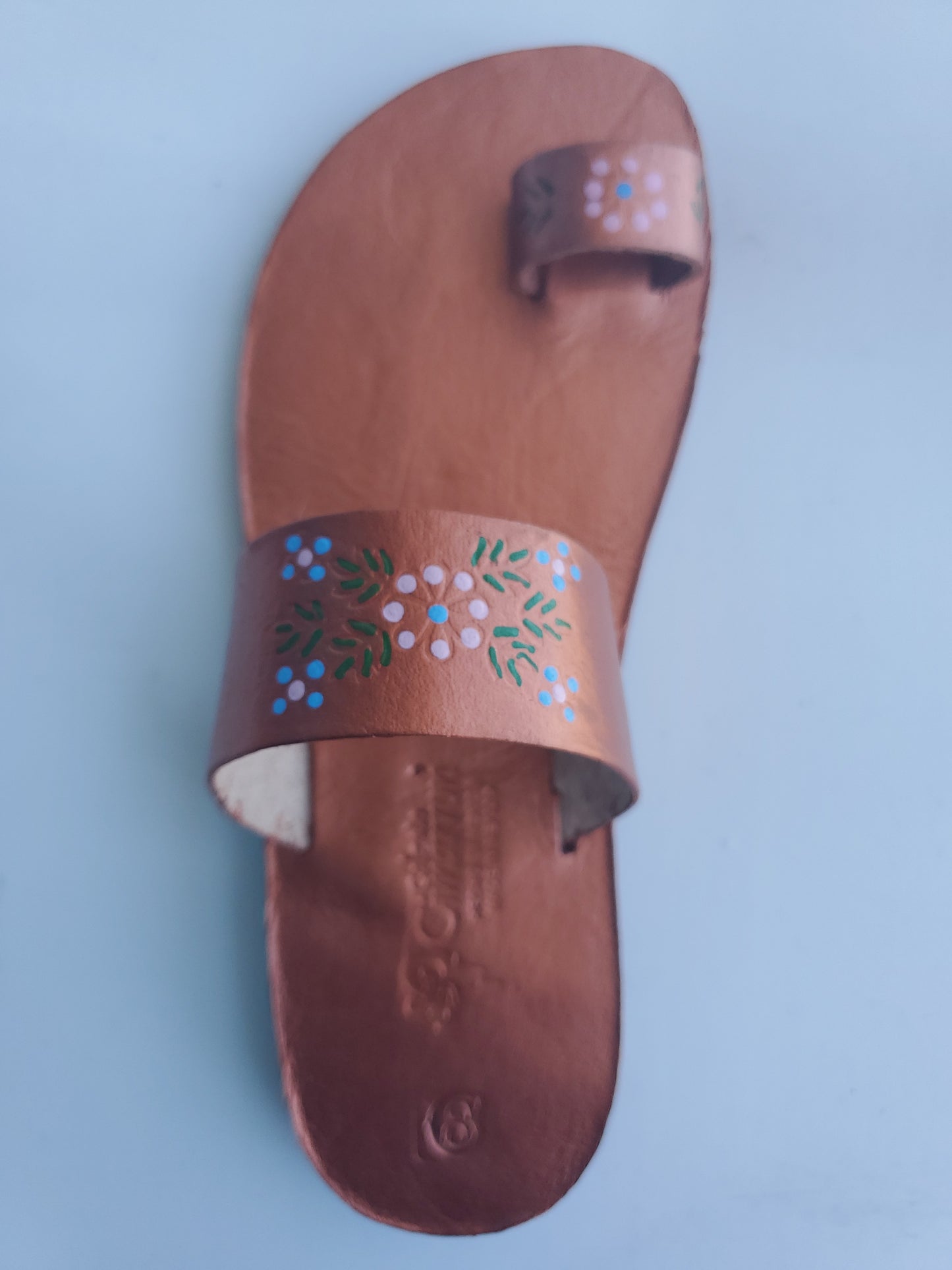 Copper color soft leather handmade toe-ring sandals with  durable lightweight outsoles and hand-painted floral pattern