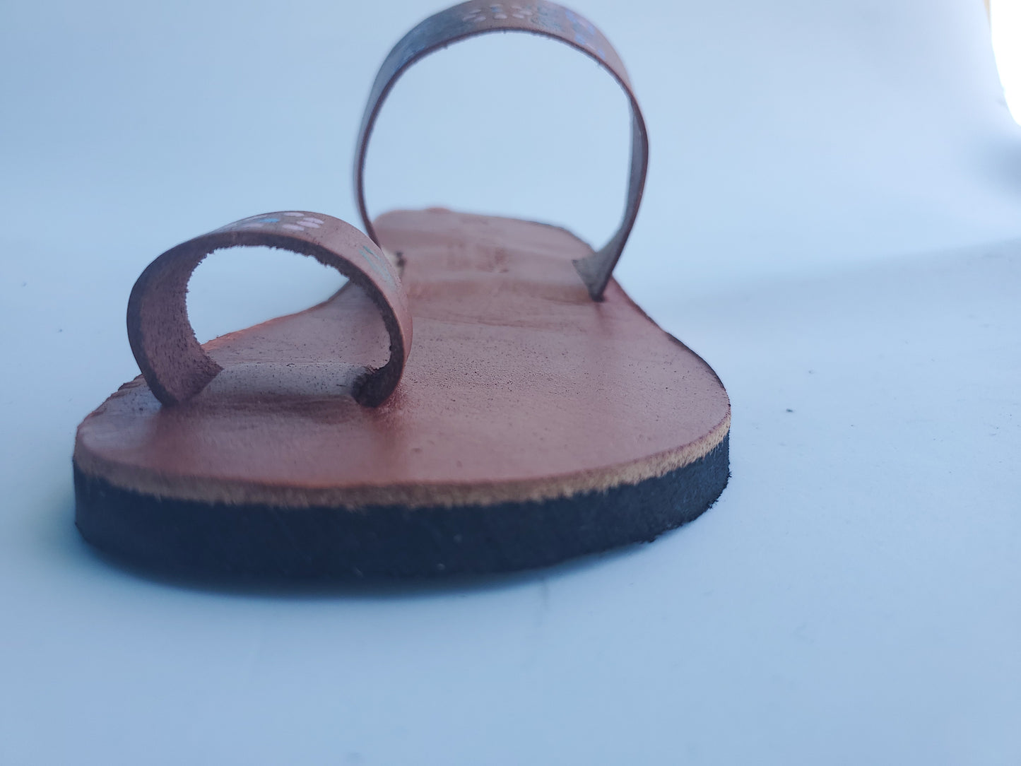 Copper color soft leather handmade toe-ring sandals with  durable lightweight outsoles and hand-painted floral pattern