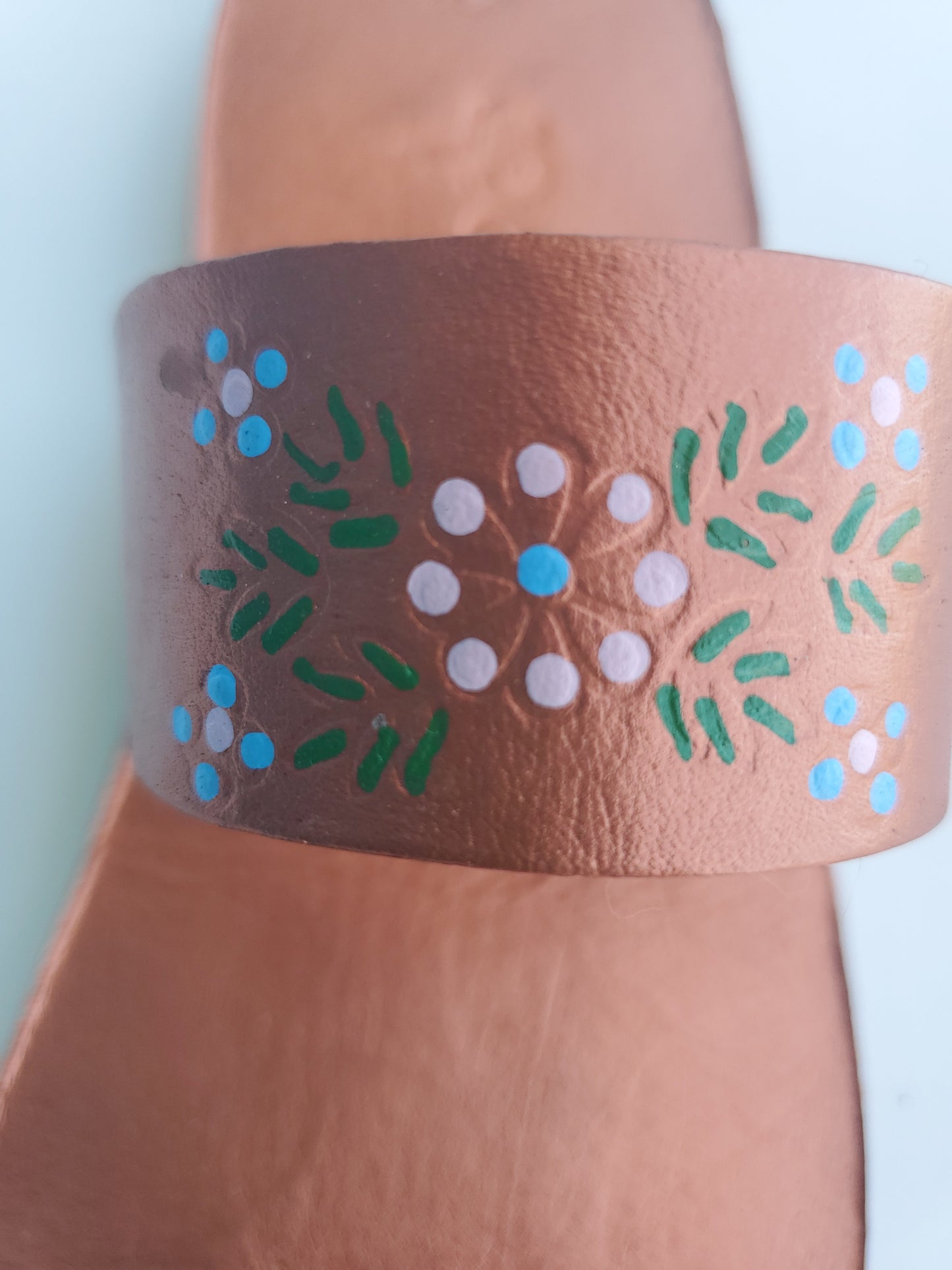 Copper color soft leather handmade toe-ring sandals with  durable lightweight outsoles and hand-painted floral pattern