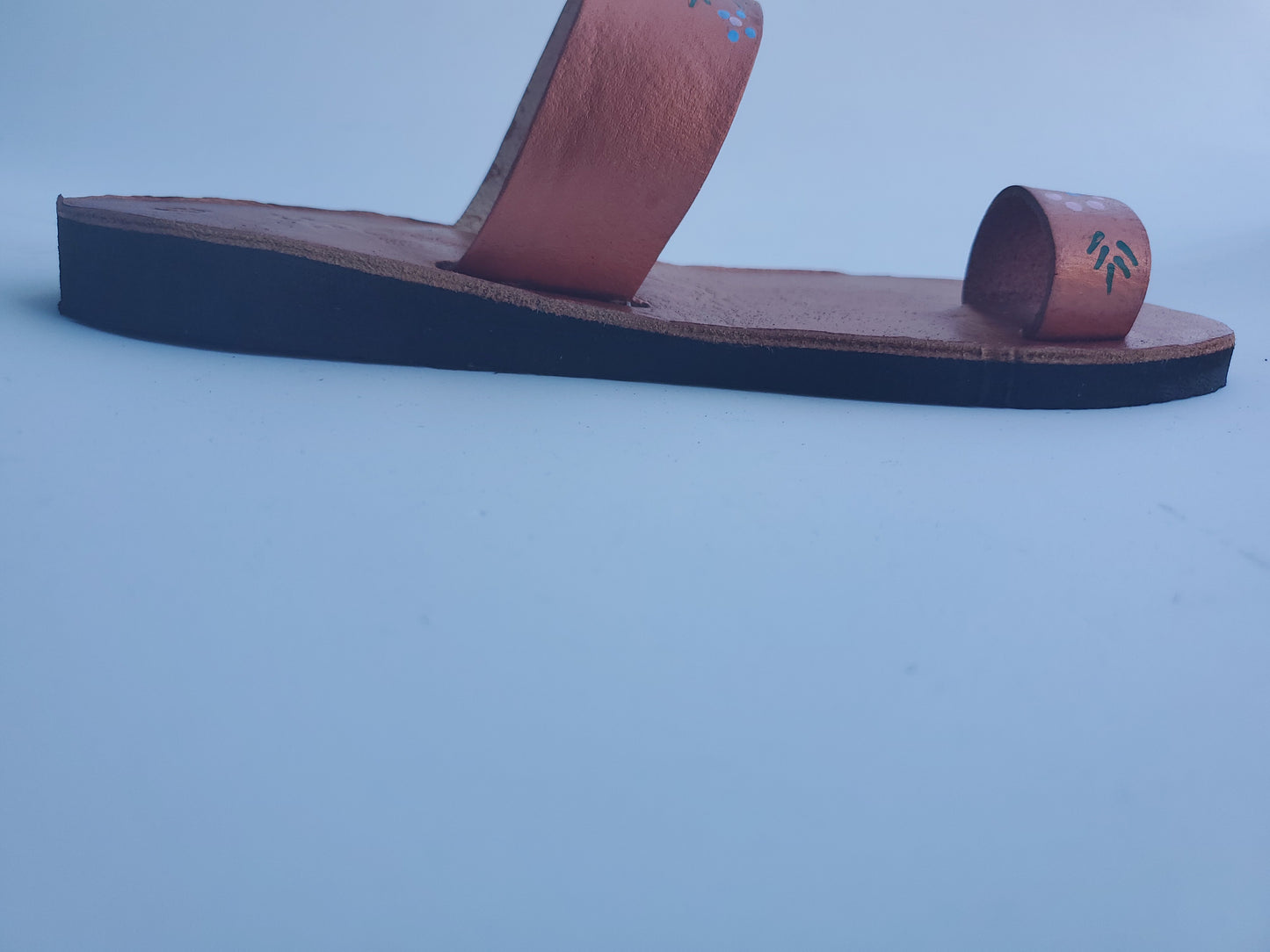 Copper color soft leather handmade toe-ring sandals with  durable lightweight outsoles and hand-painted floral pattern